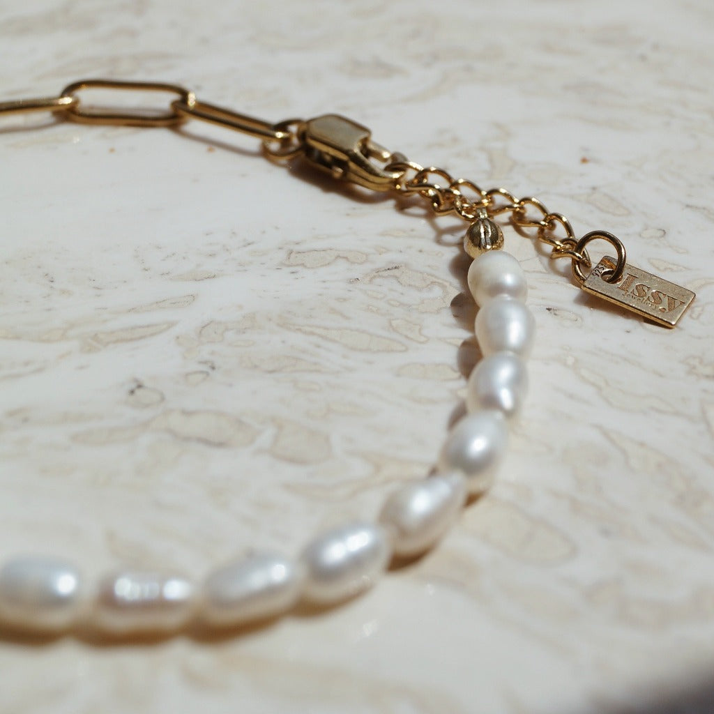 Parel armband, Parelsieraad pols, Parel en goud armband