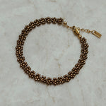 Handgemaakte stainless steel bloementjes armband van hoge kwaliteit miyuki rocailles in de kleur bruin.