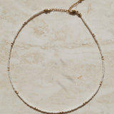 Subtiele witte ketting met goud, Subtiele witte halsketting met goud