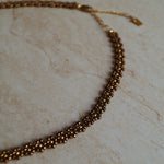 Handgemaakte stainless steel bloementjes ketting van hoge kwaliteit miyuki rocailles in de kleur bruin.