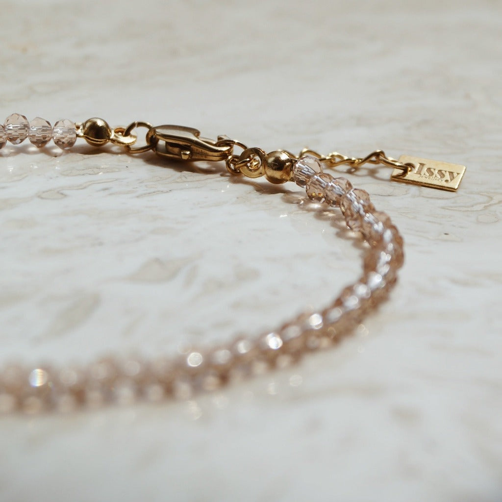 Chique Armband, champagne met goud armband