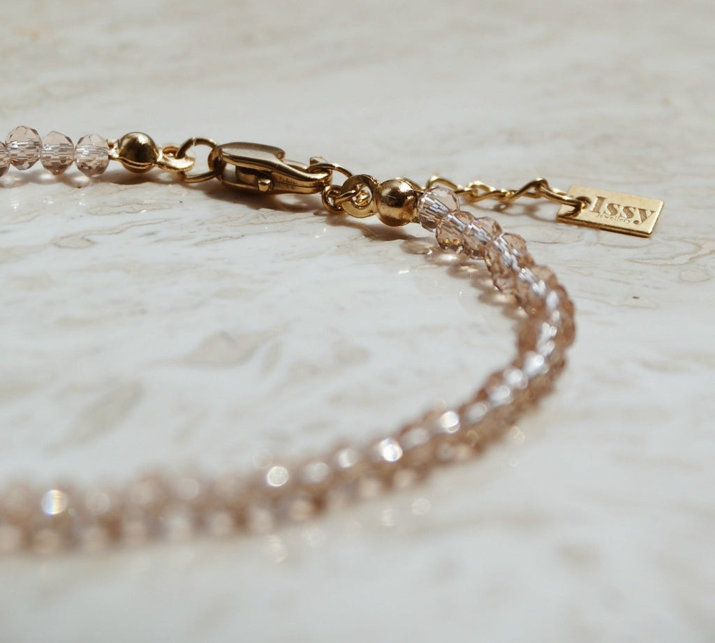 Chique Armband, champagne met goud armband