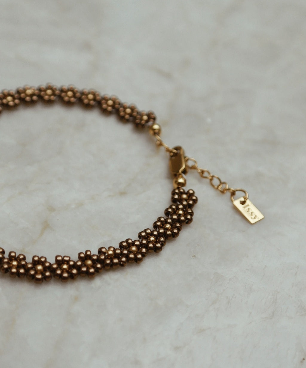 Handgemaakte stainless steel bloementjes armband van hoge kwaliteit miyuki rocailles in de kleur bruin.