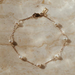 Gouden armbandje. Parel armband. Bruidssieraad. Subtiel sieraad. Chique